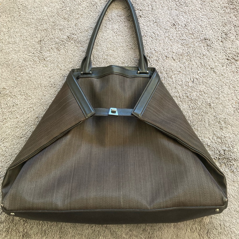 Large Akris handbag in horsehair with graphite colored hardware.